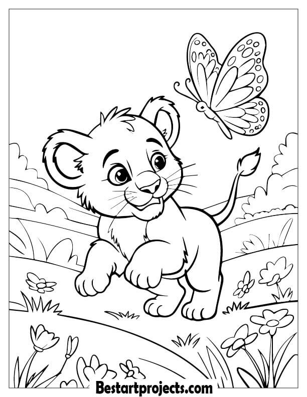 Lion cub chasing a butterfly